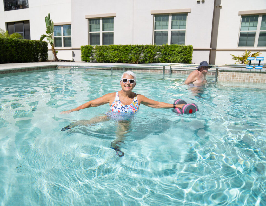 Glades at ChampionsGate Resident Exercising in the Pool