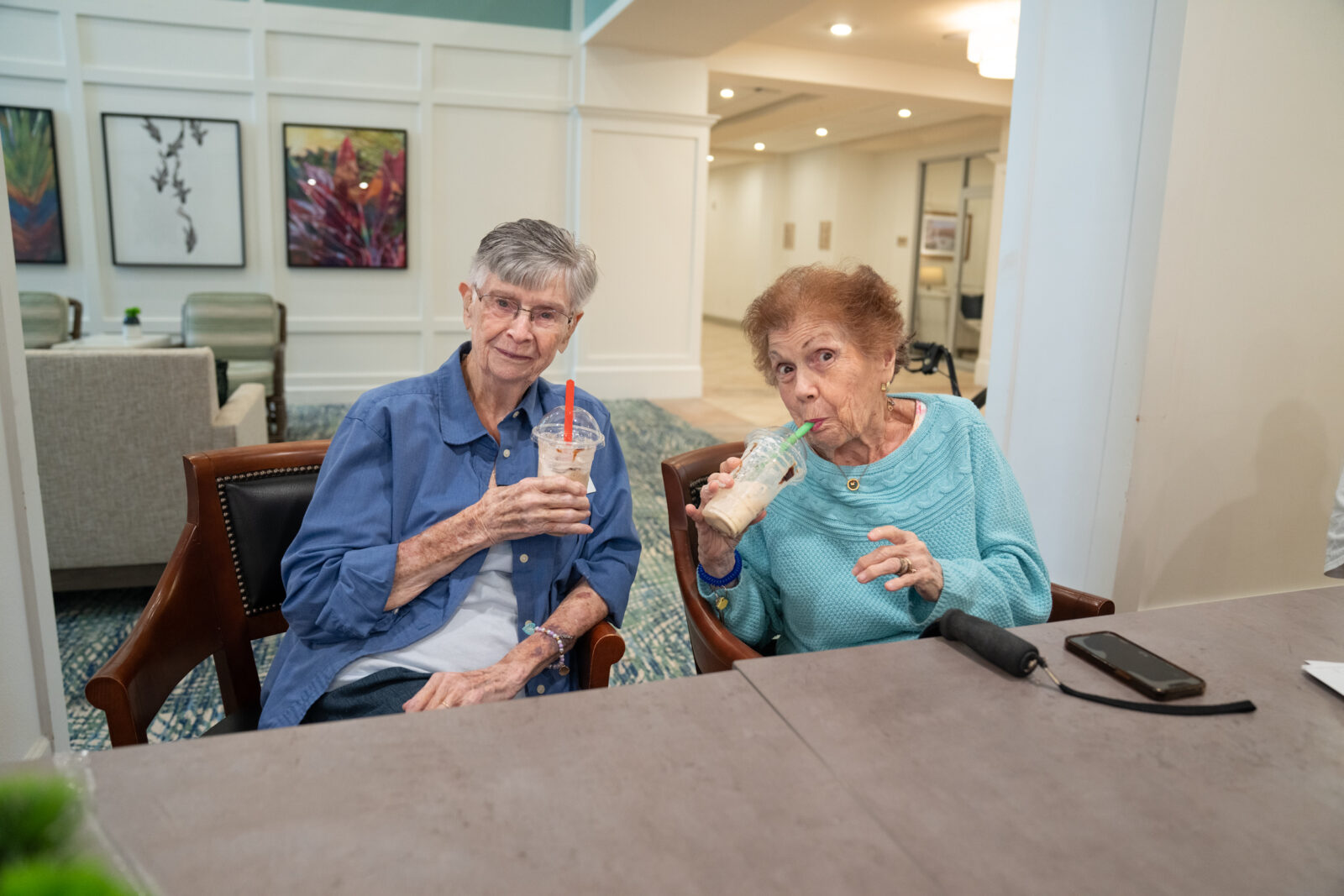 Two Residents enjoying a sweet frozen drink